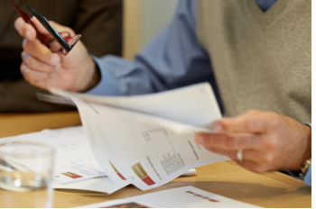 Financial Advisor going over paperwork with client